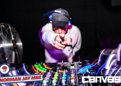 DJ playing on the decks at the Norman Jay night at Canvas Bournemouth