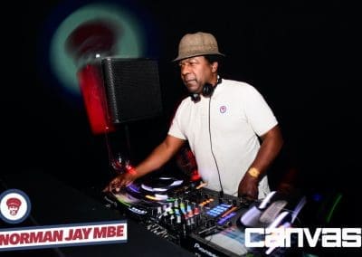 DJ playing on the decks at the Norman Jay night at Canvas Bournemouth