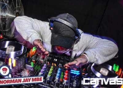 DJ playing on the decks at the Norman Jay night at Canvas Bournemouth