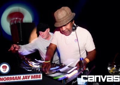 DJ playing on the decks at the Norman Jay night at Canvas Bournemouth