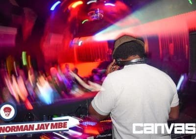 DJ playing on the decks at the Norman Jay night at Canvas Bournemouth