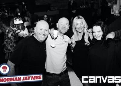 DJ posing with guests at the Norman Jay night at Canvas Bournemouth