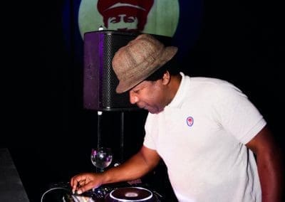 DJ playing on the decks at the Norman Jay night at Canvas Bournemouth
