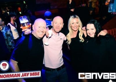 DJ posing with guests at the Norman Jay night at Canvas Bournemouth