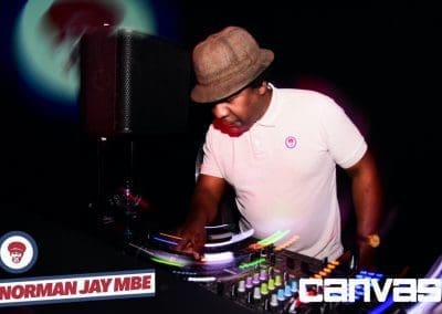 DJ playing on the decks at the Norman Jay night at Canvas Bournemouth