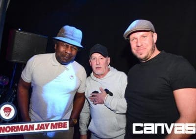 DJ posing with guests at the Norman Jay night at Canvas Bournemouth