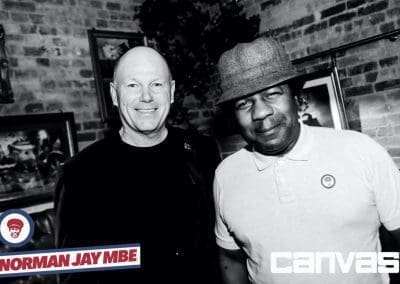 DJ posing with guests at the Norman Jay night at Canvas Bournemouth