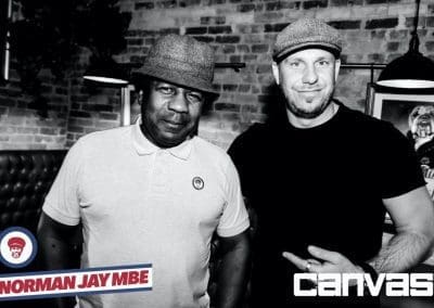 DJ posing with guests at the Norman Jay night at Canvas Bournemouth