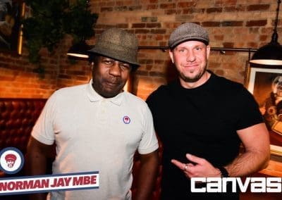 DJ posing with guests at the Norman Jay night at Canvas Bournemouth