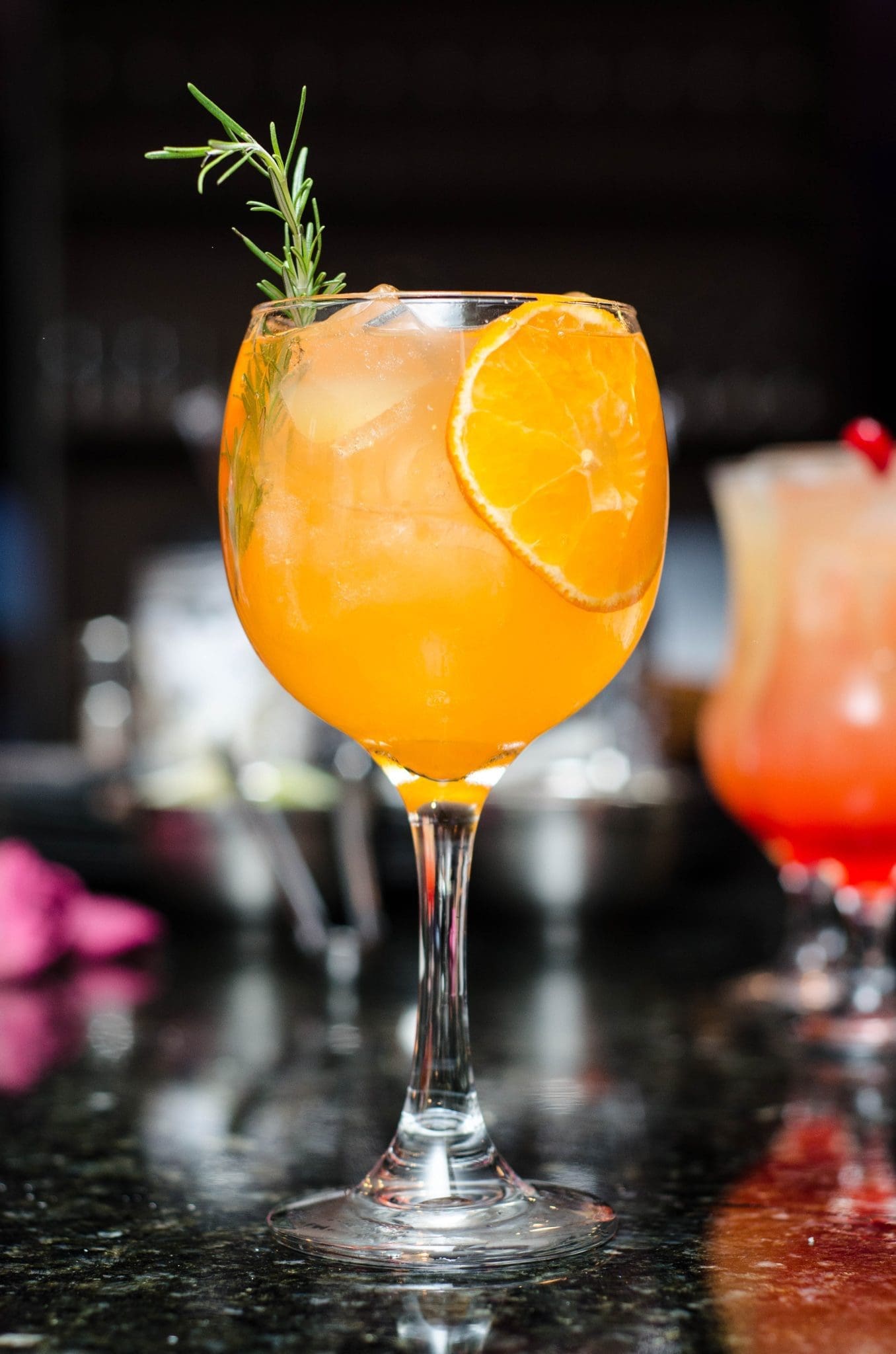 Orange cocktail with garnish at the Canvas cocktail bar, Bournemouth